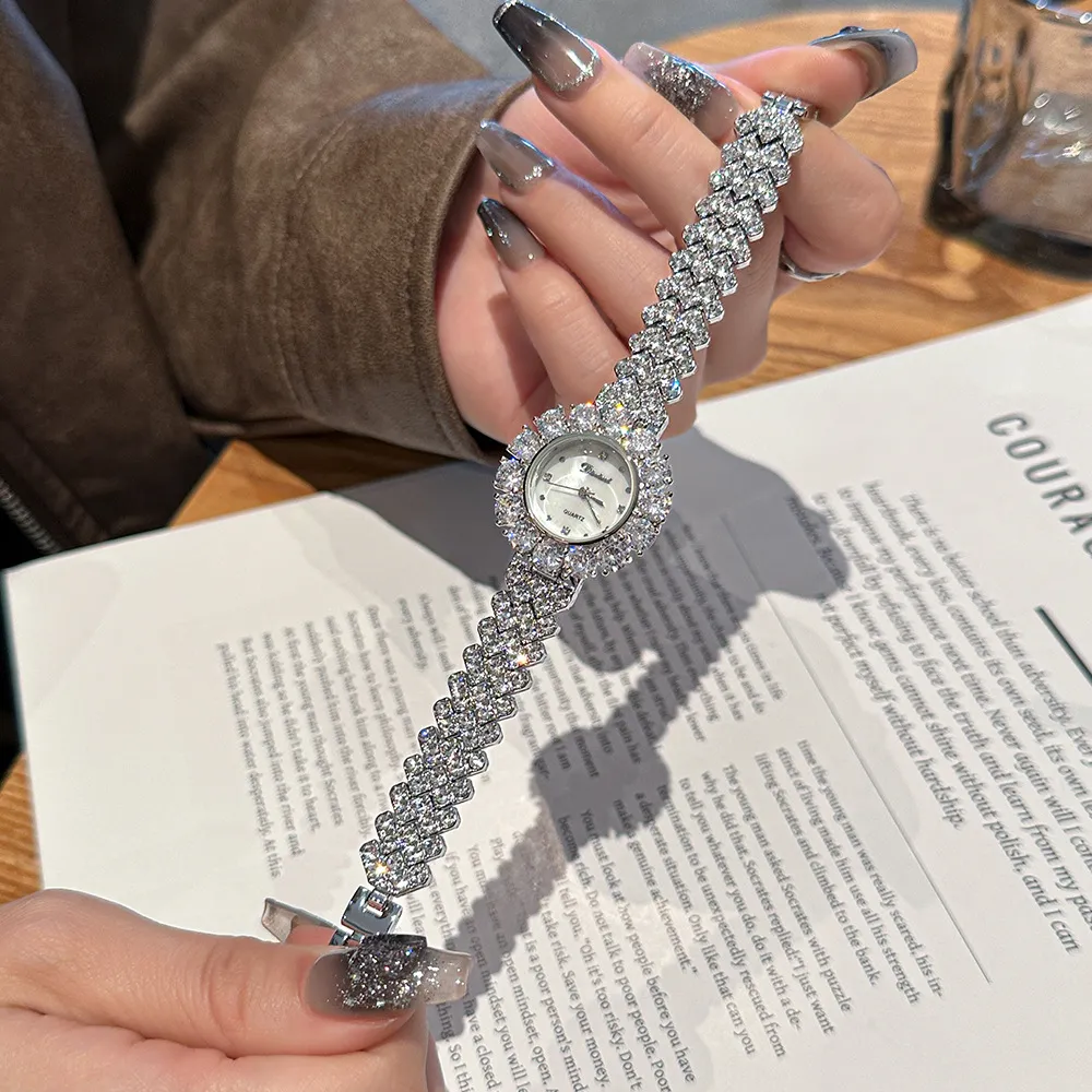 Retro silver diamond women’s watch held by hand – luxury quartz design – WatchTrio