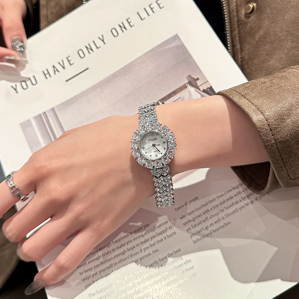 Vintage silver women’s diamond watch on wrist – elegant bracelet style – WatchTrio