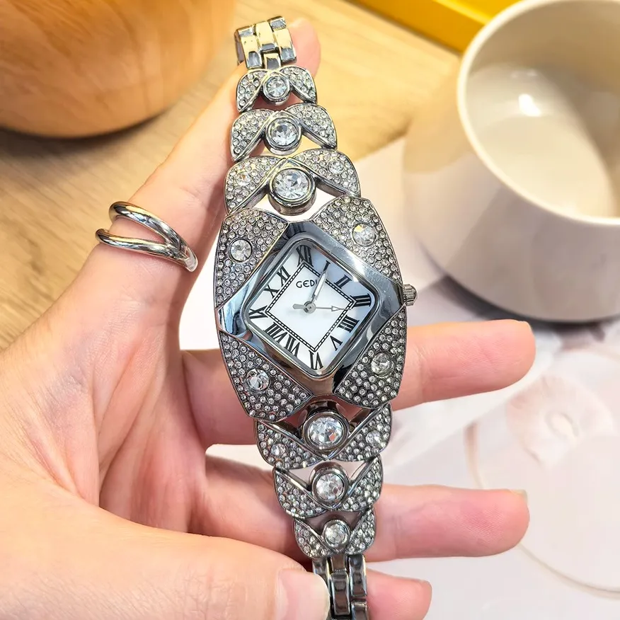 Vintage silver women’s diamond watch with hollow bracelet and mother-of-pearl dial – WatchTrio