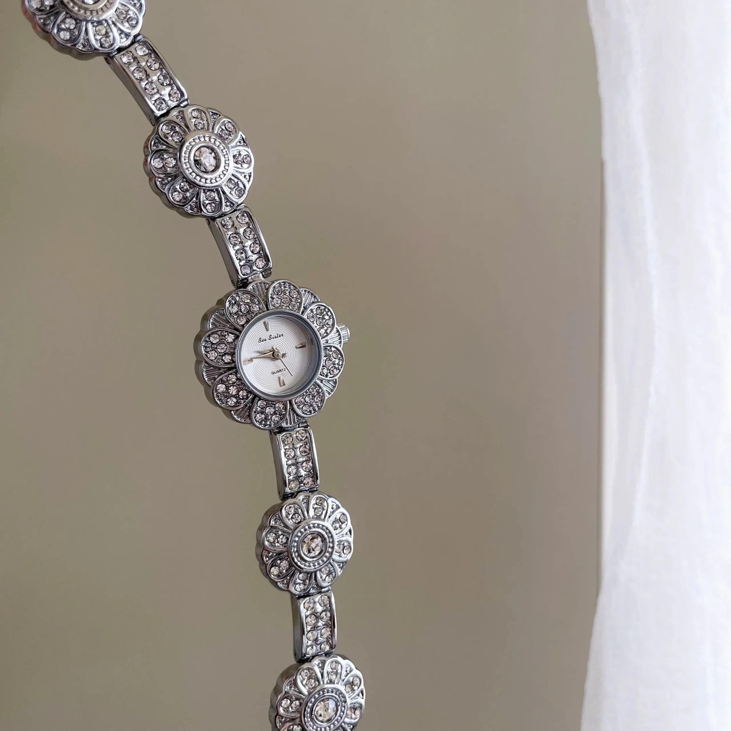 Retro silver women’s bracelet watch with floral crystal design – WatchTrio