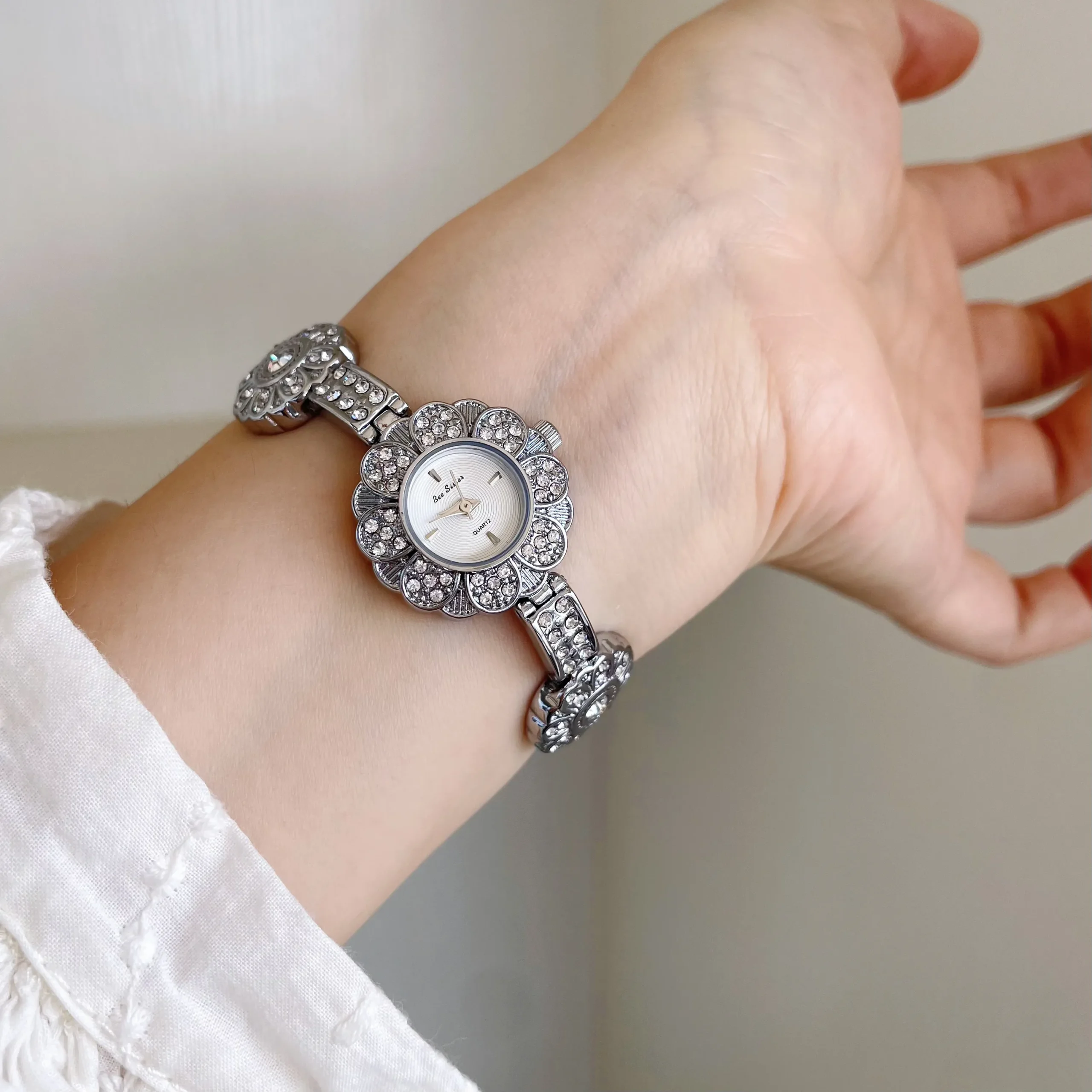 Vintage silver women’s flower bracelet watch with crystal accents – WatchTrio