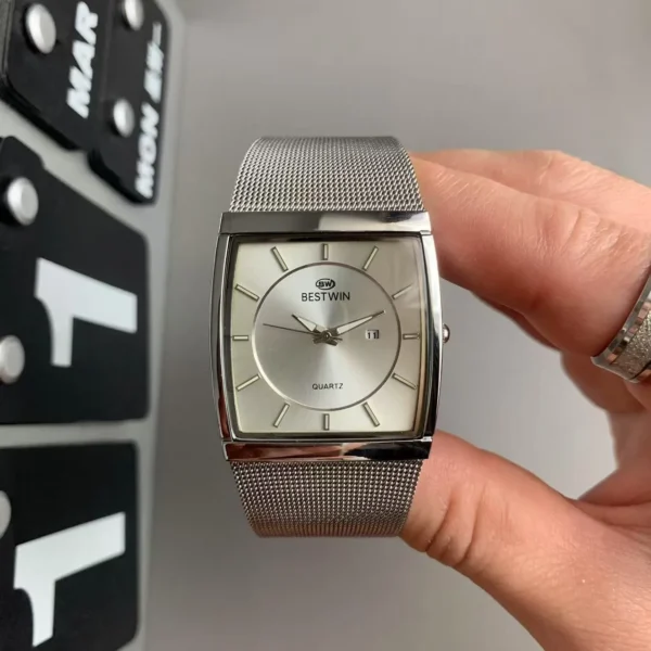 vintage silver mens watch with rectangular dial and mesh strap