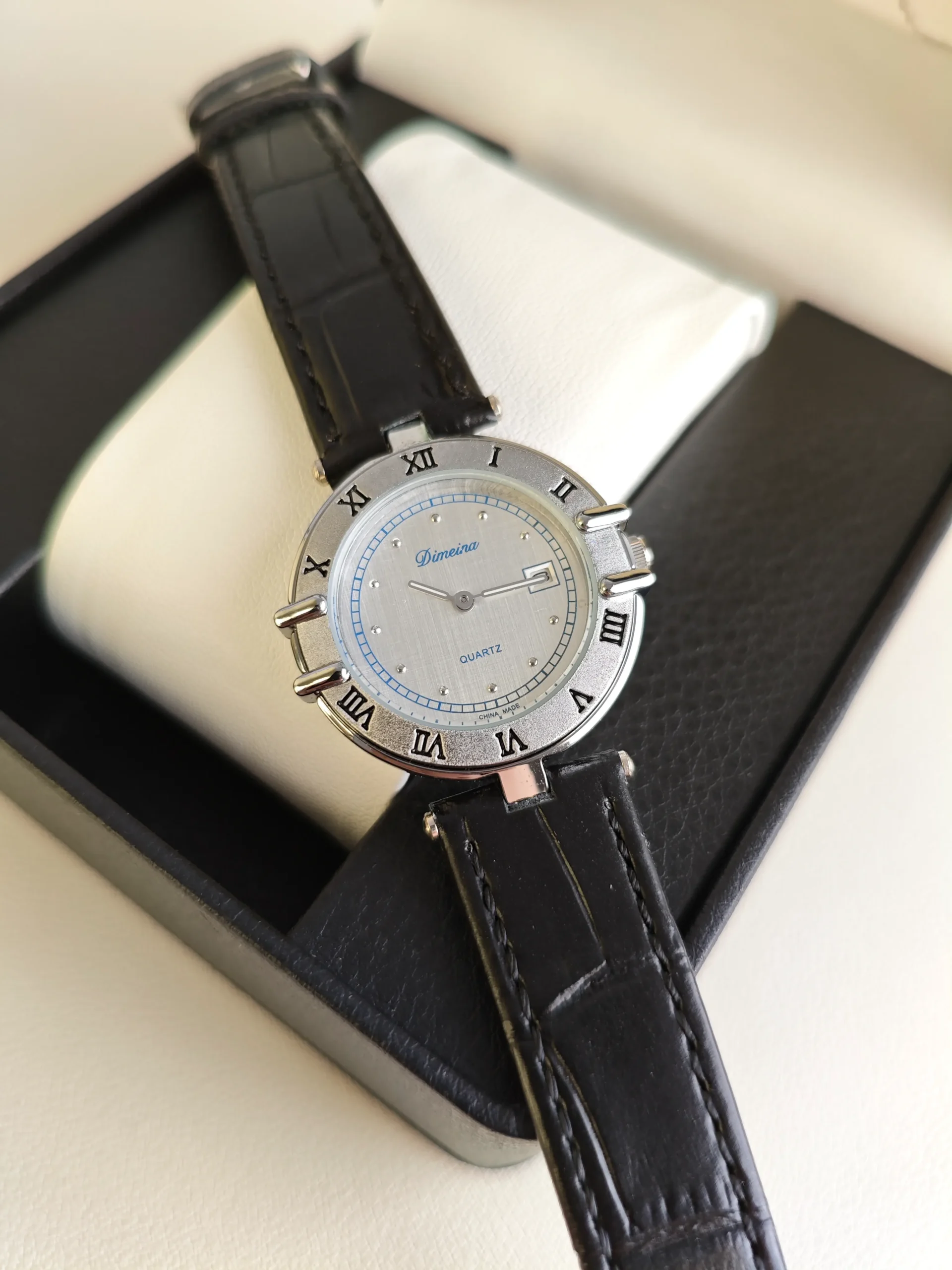 Vintage silver women’s watch with Roman numeral dial side angle – WatchTrio