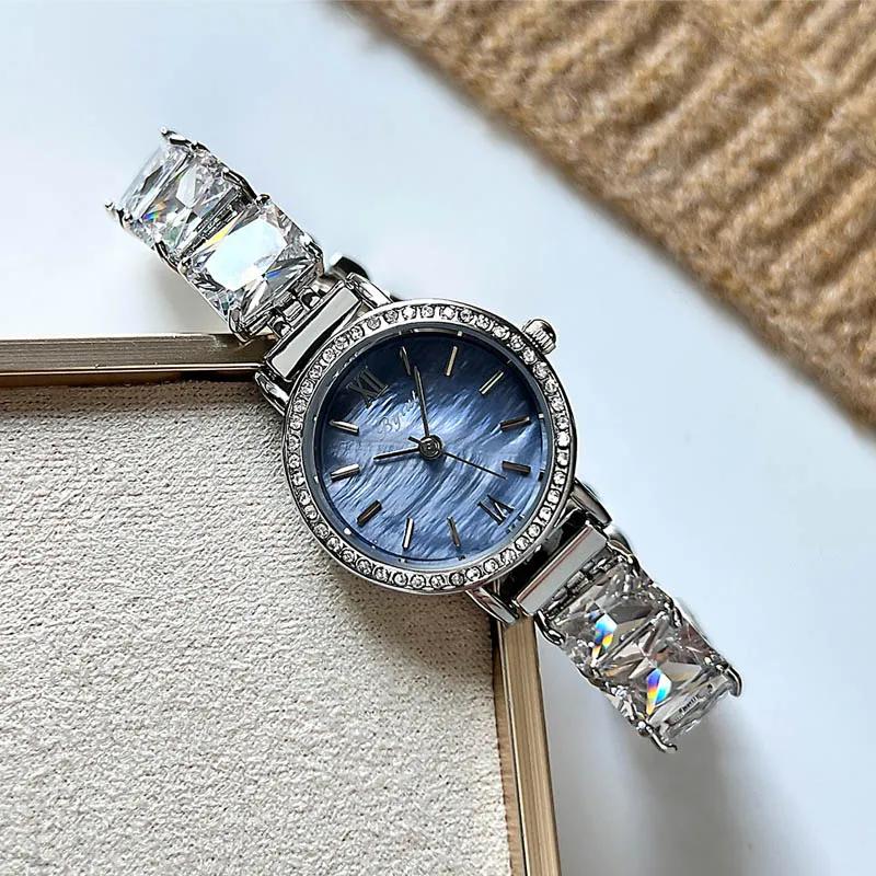 Vintage silver women’s crystal bracelet watch with blue dial – WatchTrio