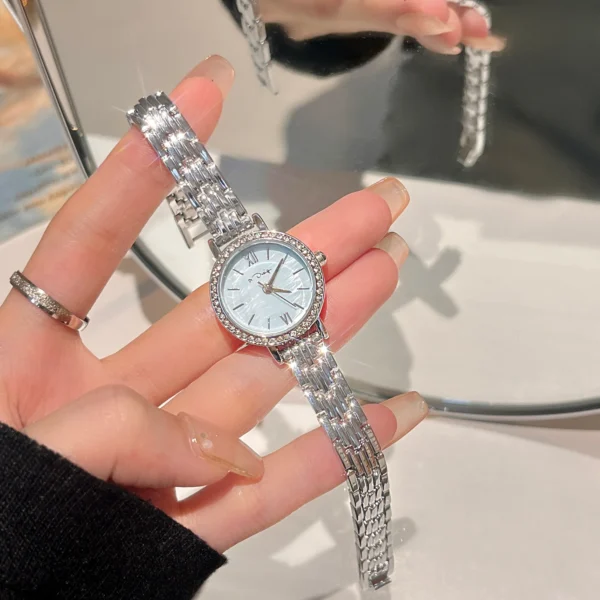 Vintage silver women’s diamond-accented watch with blue dial – WatchTrio