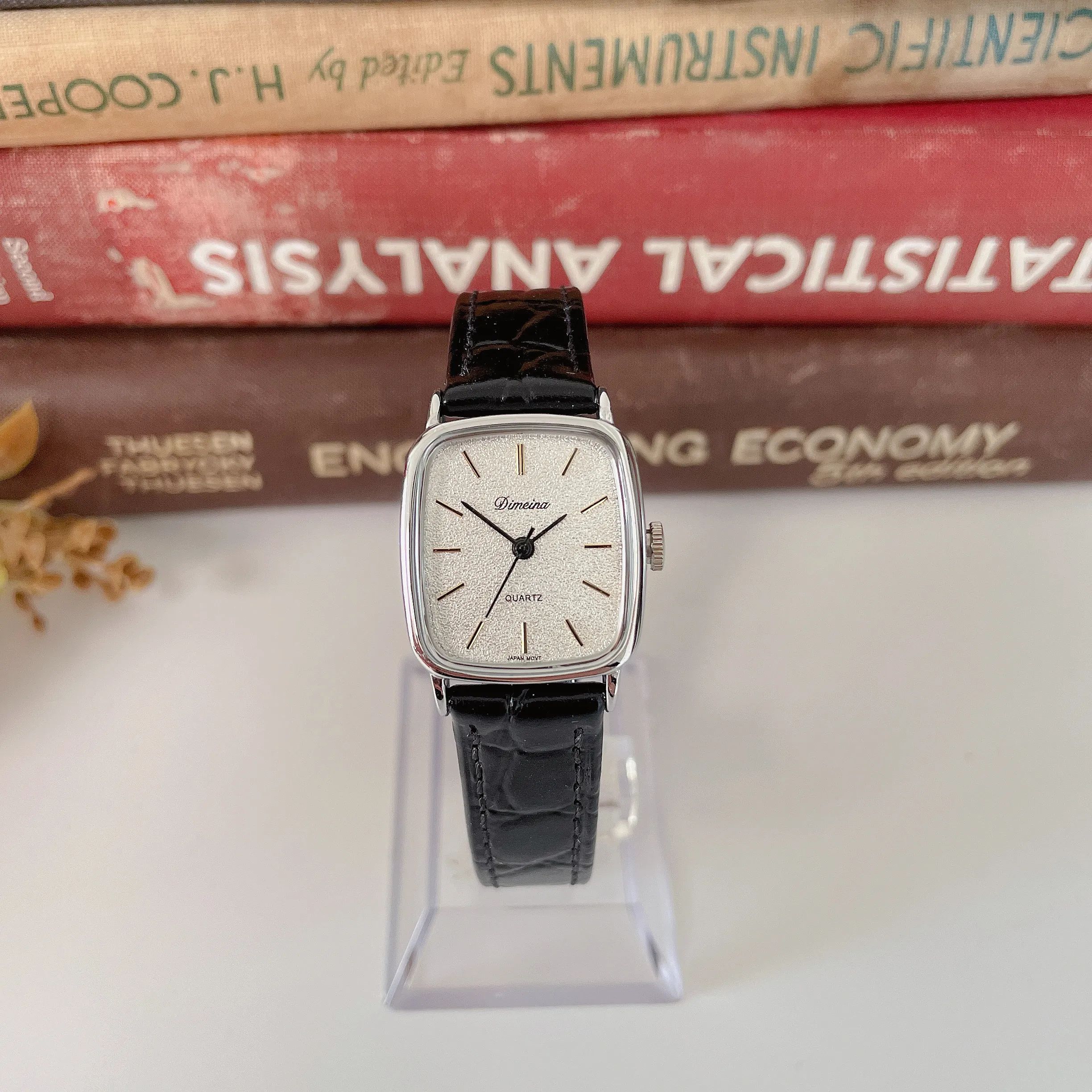 Vintage silver women’s leather watch with black strap and square dial – WatchTrio