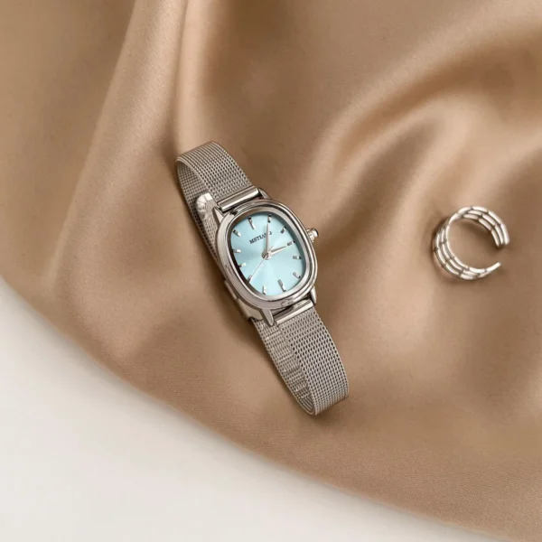 Vintage silver women’s oval watch with blue dial – WatchTrio