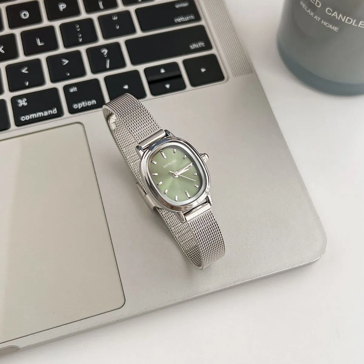 Vintage silver women’s oval watch with green dial – WatchTrio