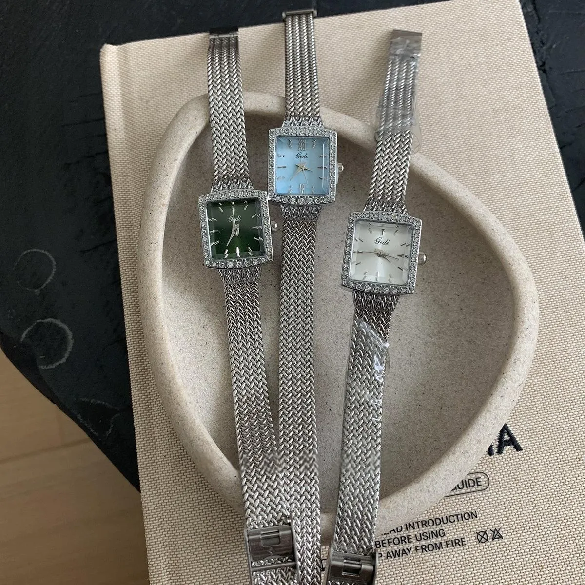 Vintage silver women’s square diamond-accented watches with blue, green, and white mother-of-pearl dials – WatchTrio