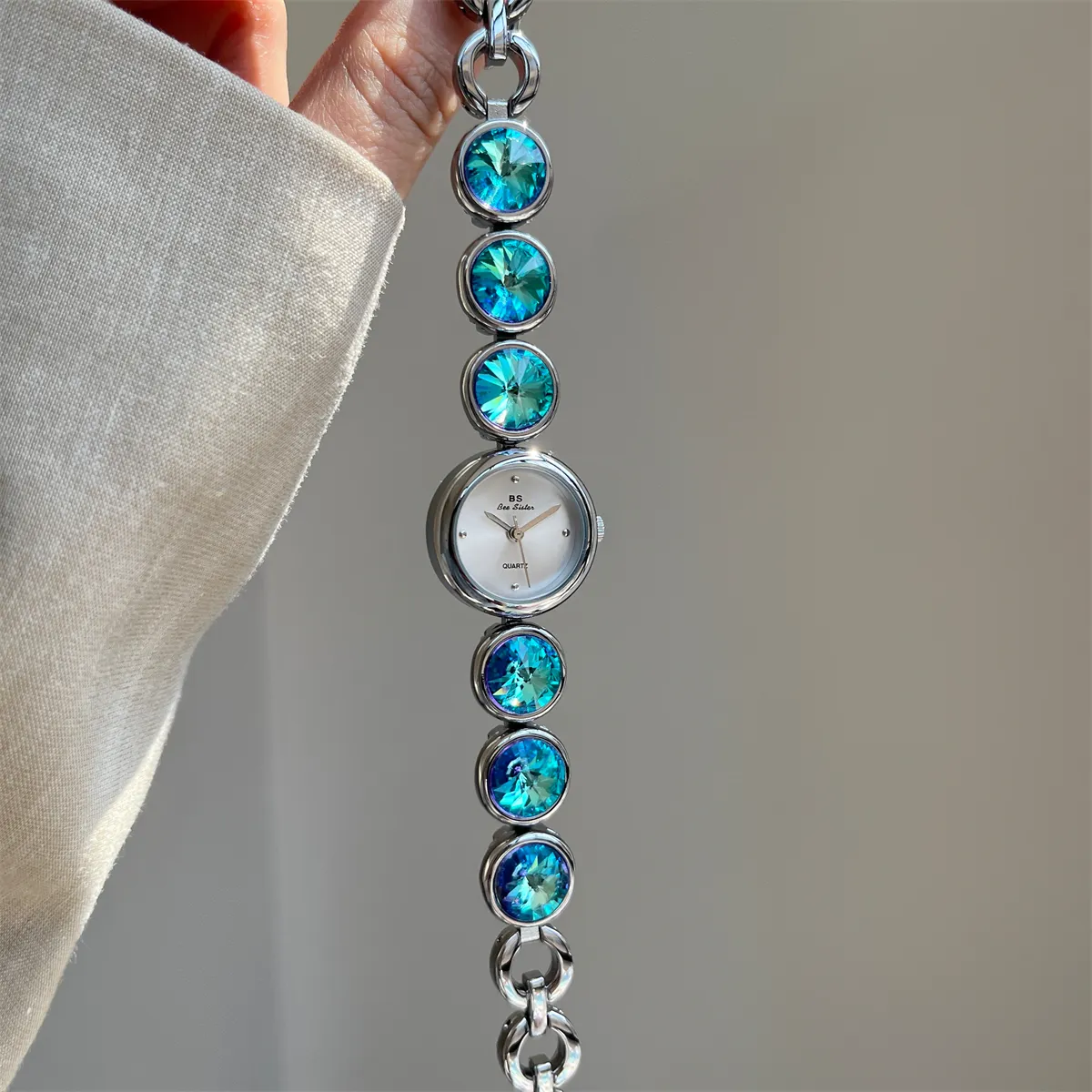Elegant vintage silver women’s watch with teal crystal bracelet – WatchTrio