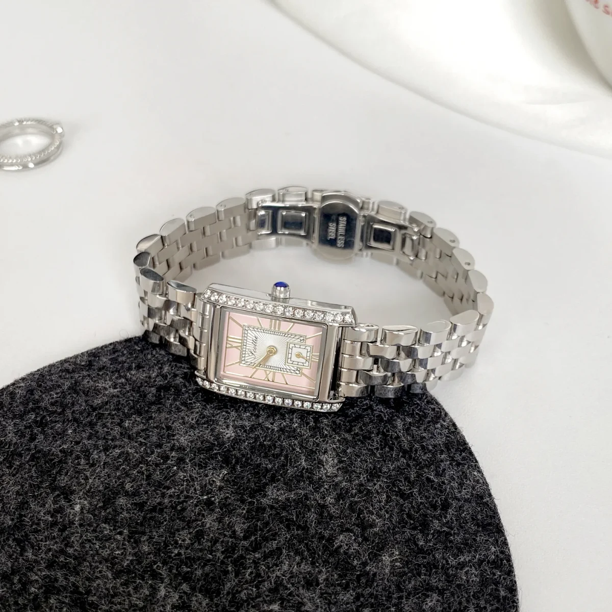 Side view of vintage silver strap women’s watch with rectangular pink dial – WatchTrio