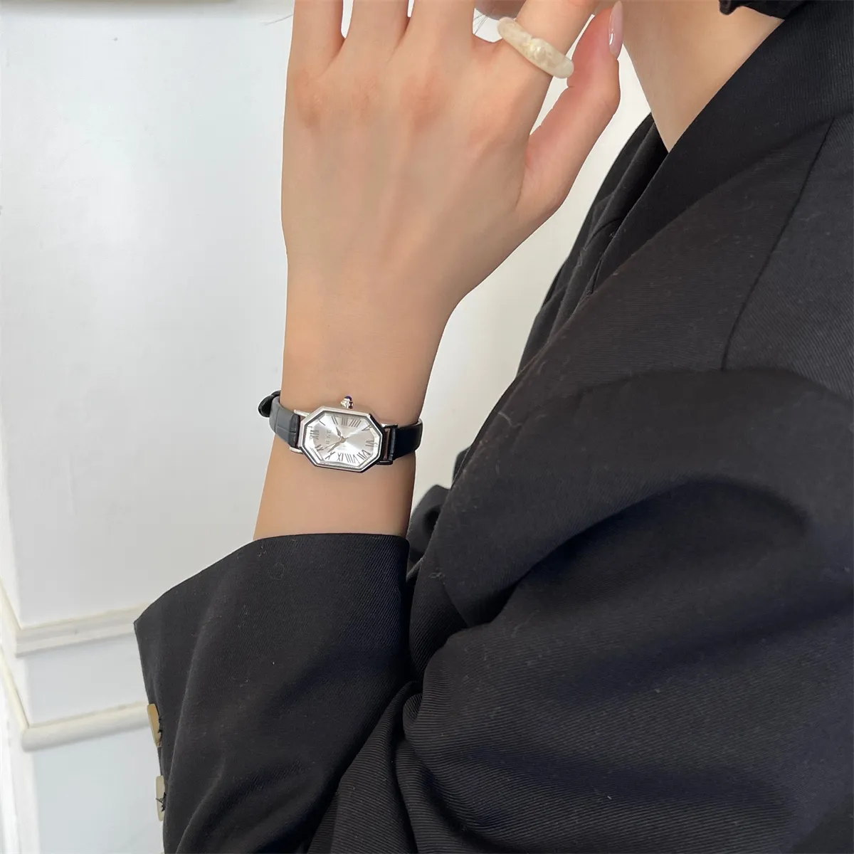 Silver case vintage diamond watch with black leather strap