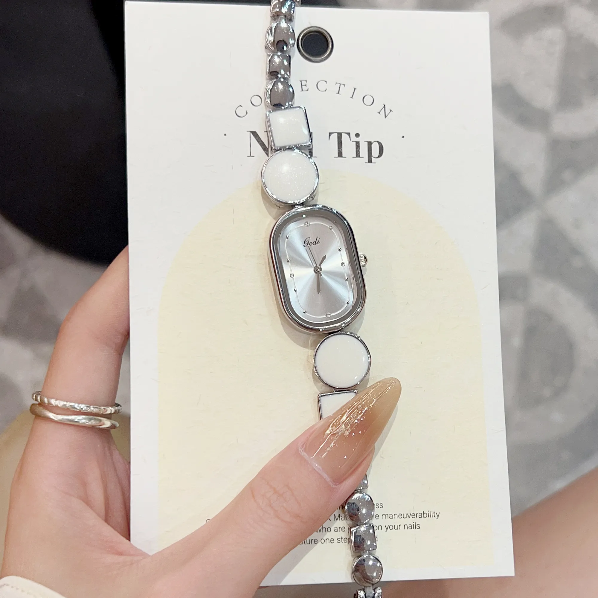 Vintage women’s silver irregular bracelet watch with white dial – WatchTrio