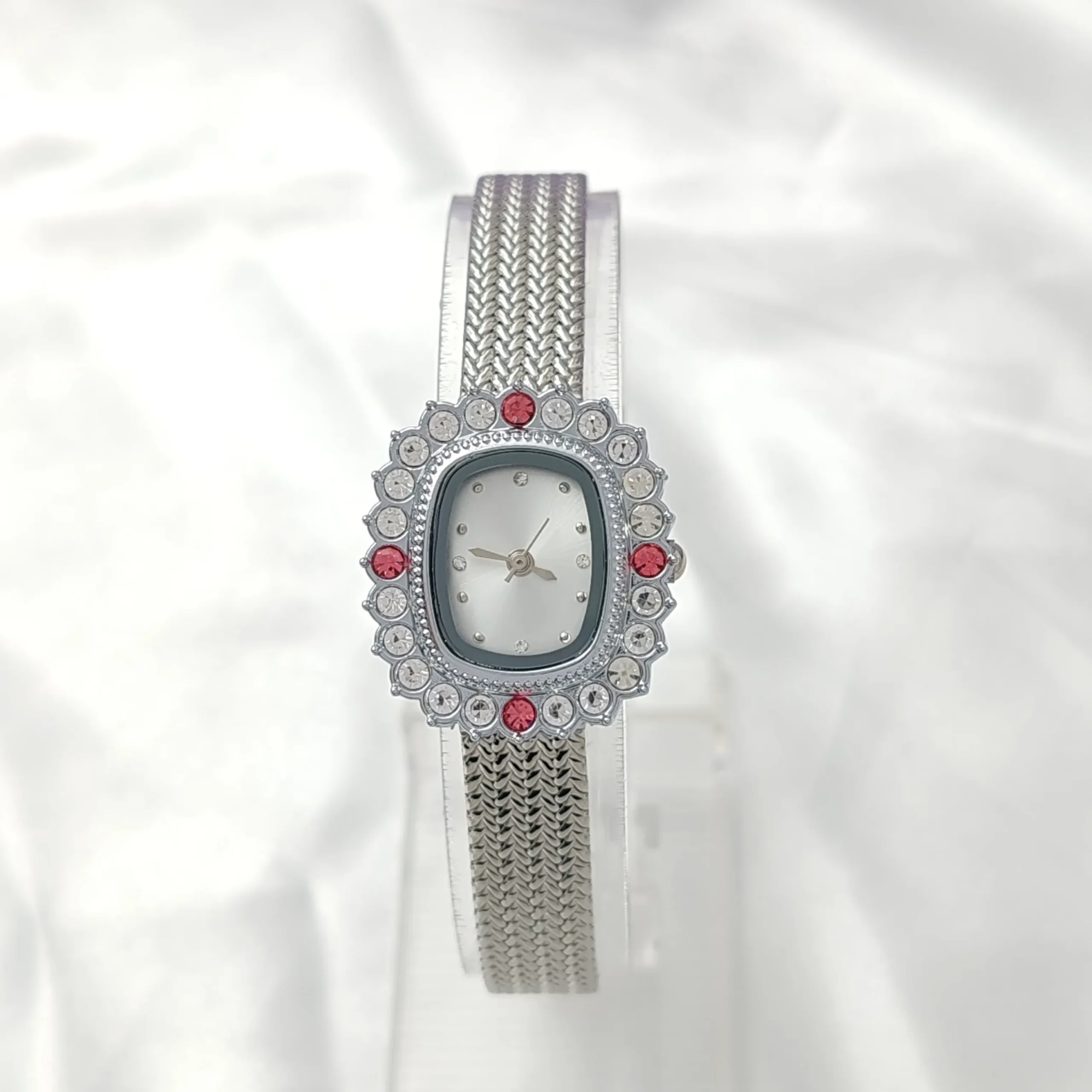 Silver vintage ladies watch with crystal bezel and white dial