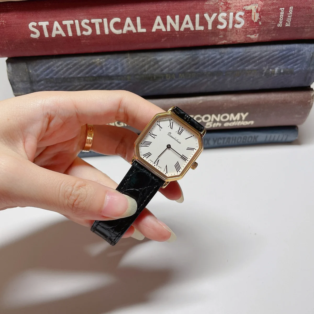 Vintage women’s leather watch with black strap and gold square dial – WatchTrio