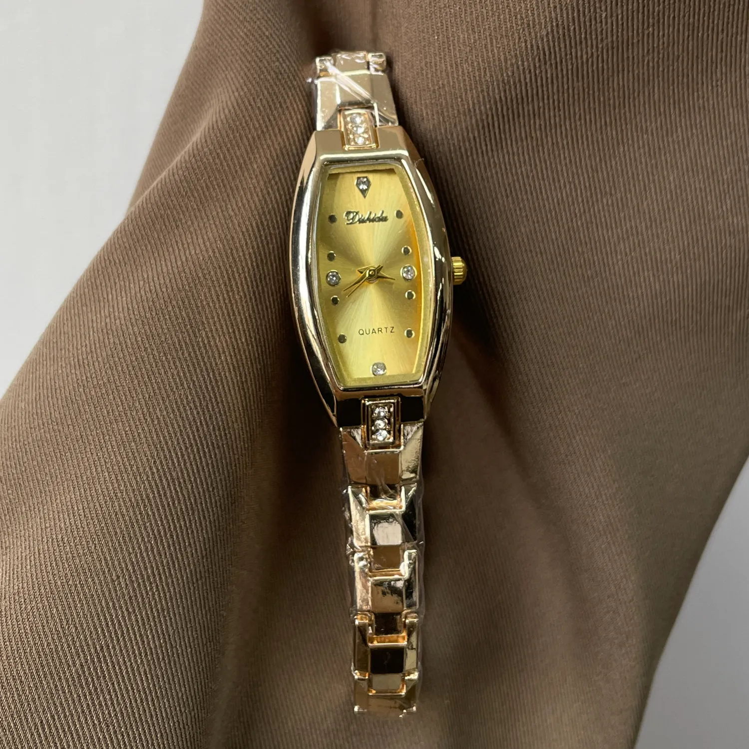 Women’s gold diamond-accent quartz watch