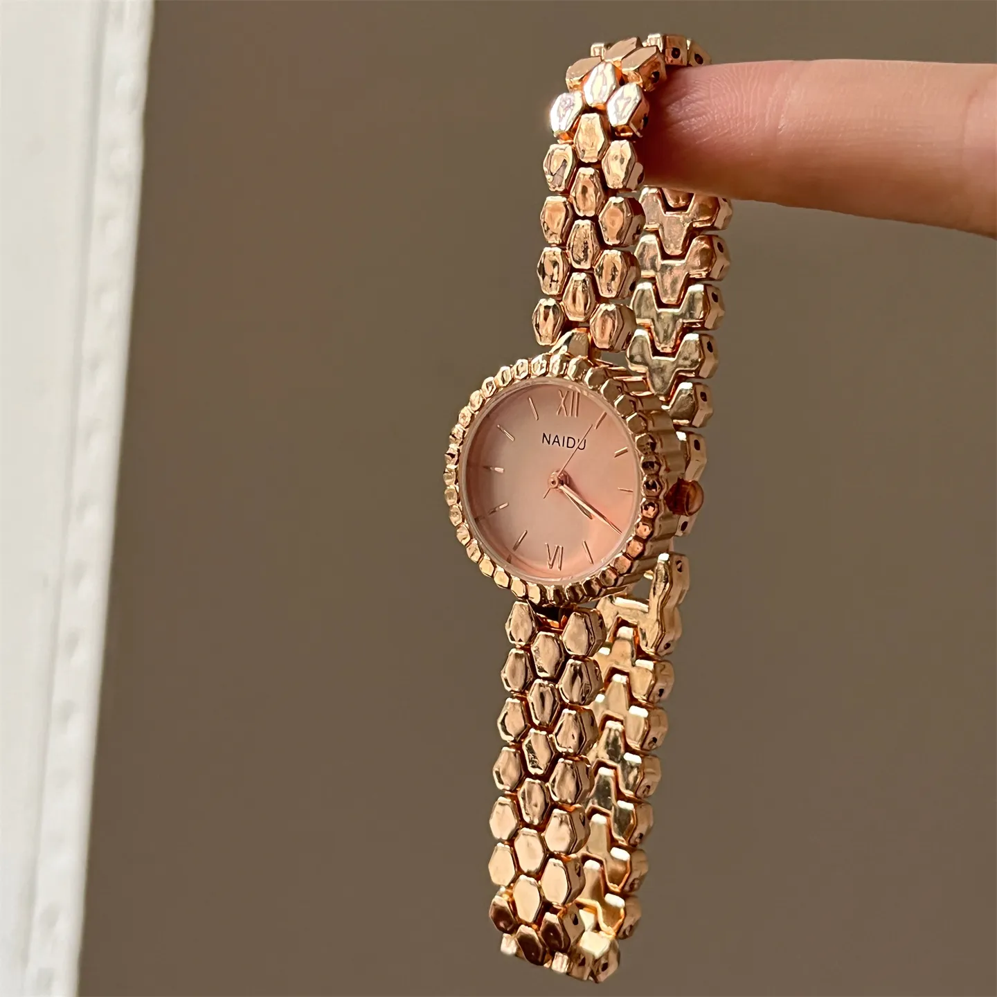 Women’s rose gold honeycomb bracelet quartz watch